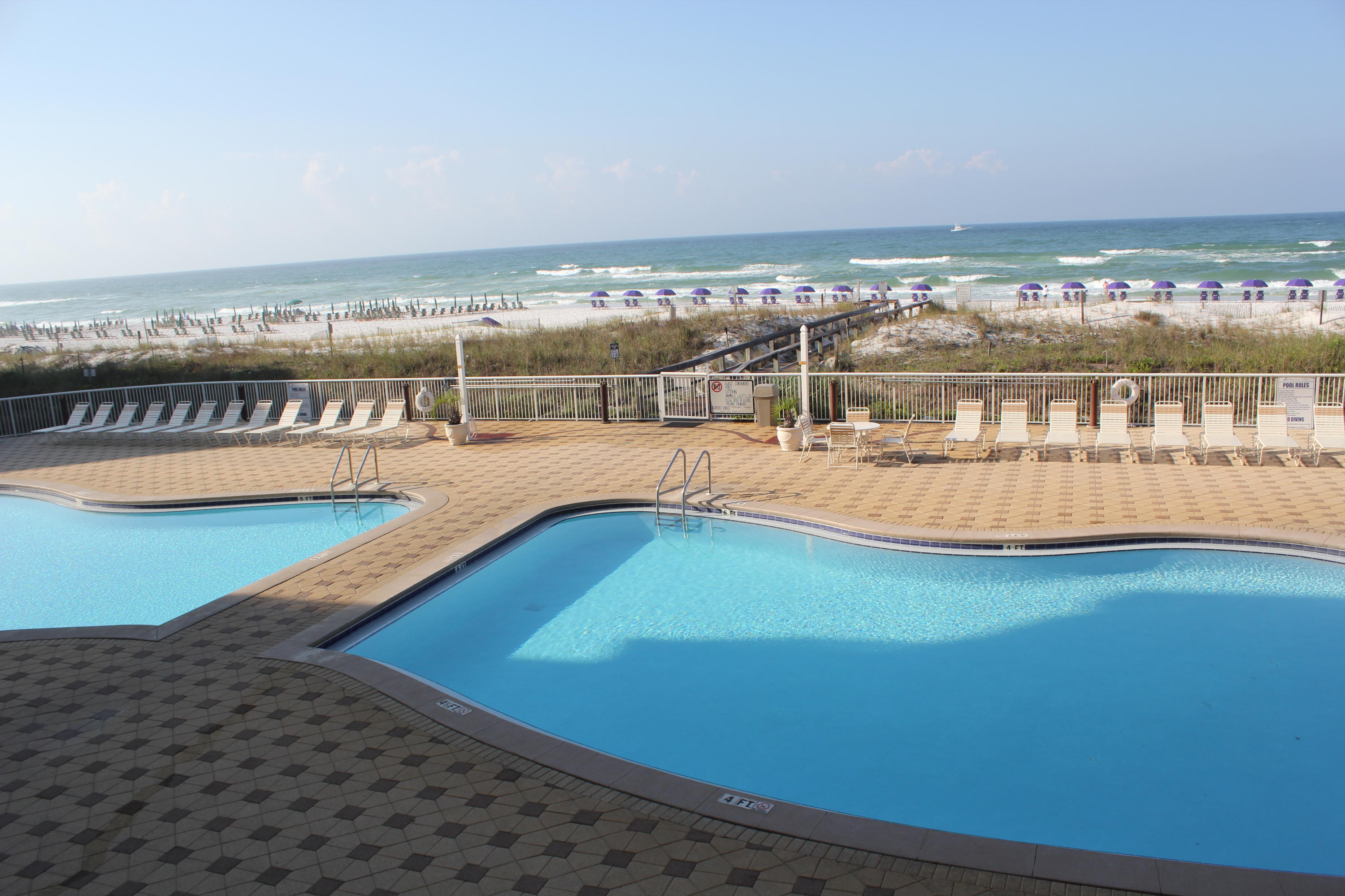 1111 Santa Rosa Boulevard, Unit 206 Fort Walton Beach, FL 32548 - Photo 38 of 46 a view of a swimming pool and an ocean