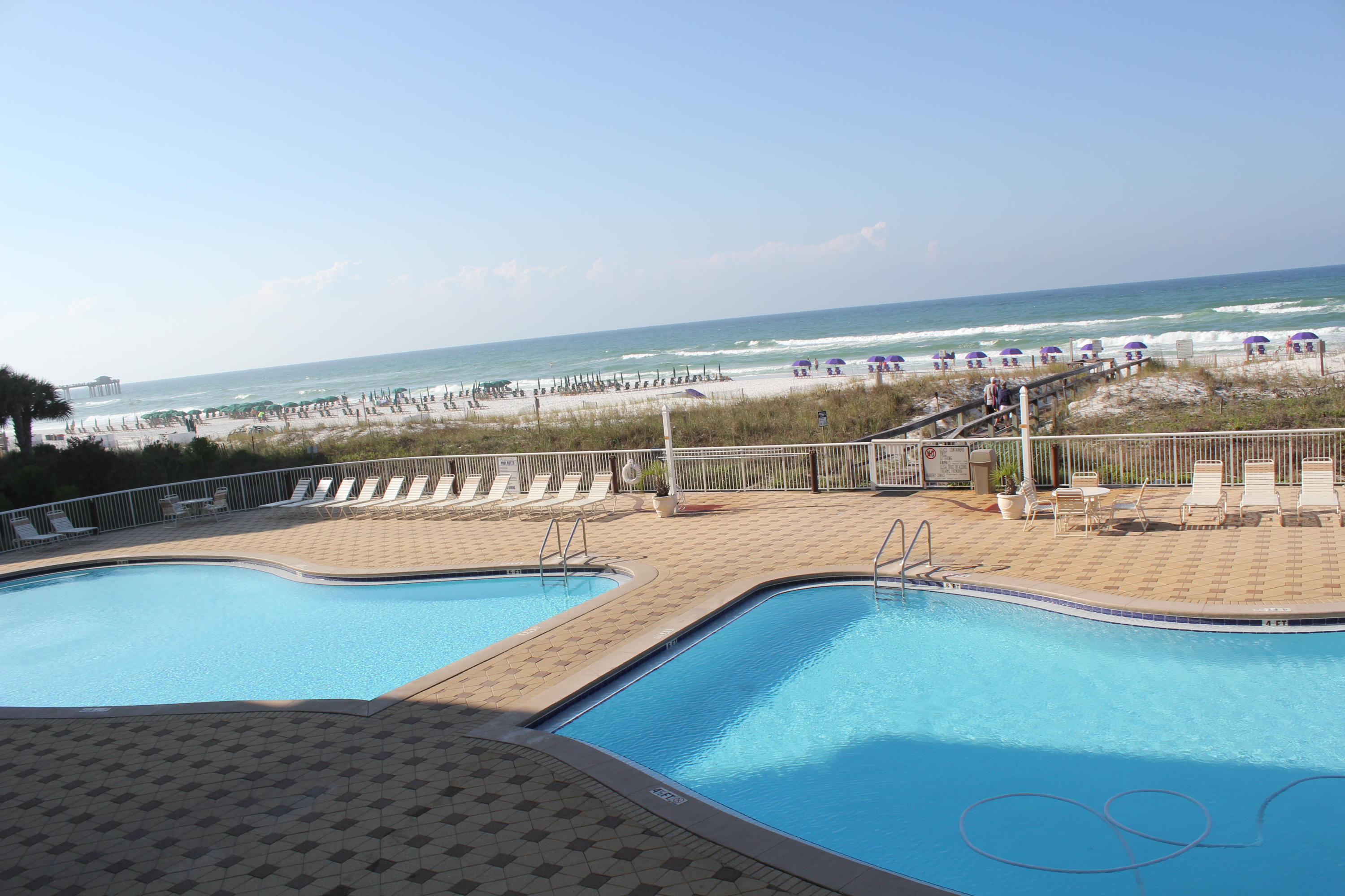 1111 Santa Rosa Boulevard, Unit 206 Fort Walton Beach, FL 32548 - Photo 41 of 46 a view of a swimming pool with an ocean view