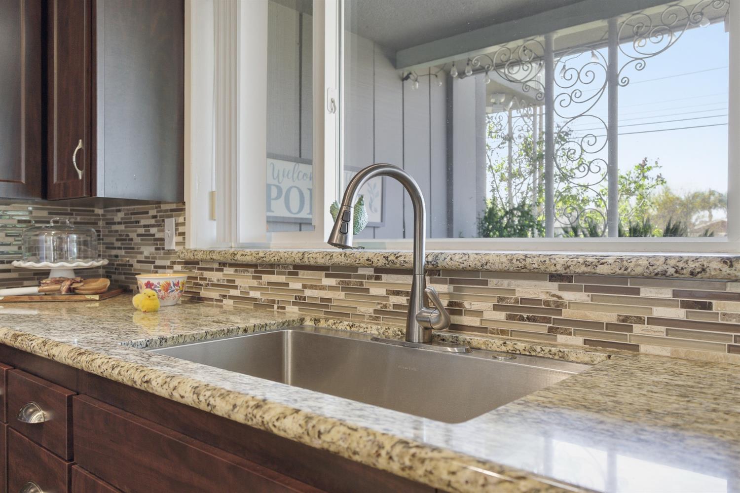 574 North Frankwood Avenue Reedley, CA 93654 - Photo 14 of 37 a close view of sink and tap