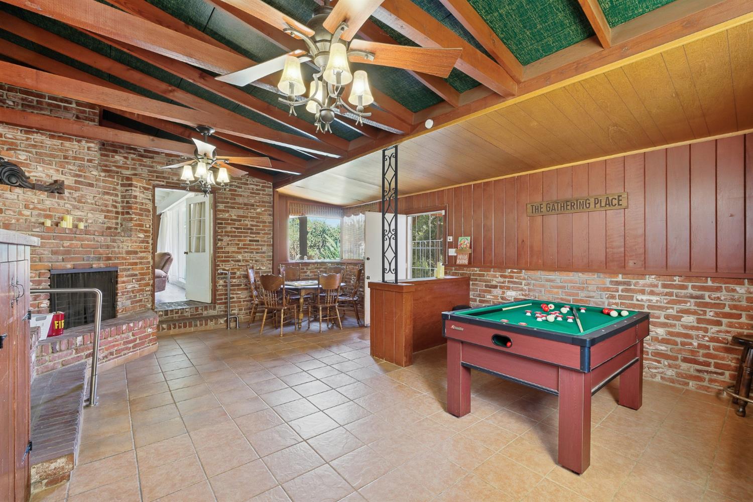 574 North Frankwood Avenue Reedley, CA 93654 - Photo 15 of 37 a outdoor space with patio furniture and a fireplace