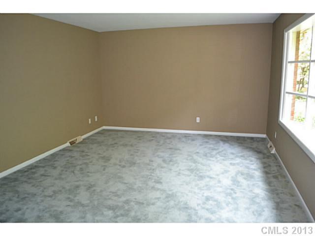 1447 McIlroy Road Charlotte, NC 28212 - Photo 5 of 12 a view of an empty room and window