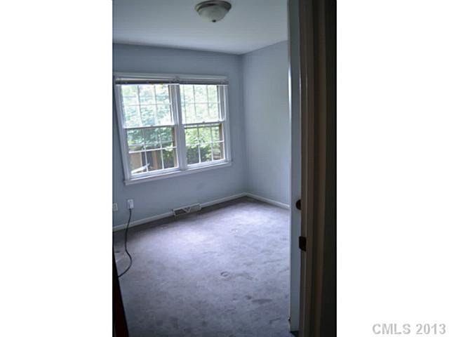 1447 McIlroy Road Charlotte, NC 28212 - Photo 8 of 12 a view of an empty room with a window