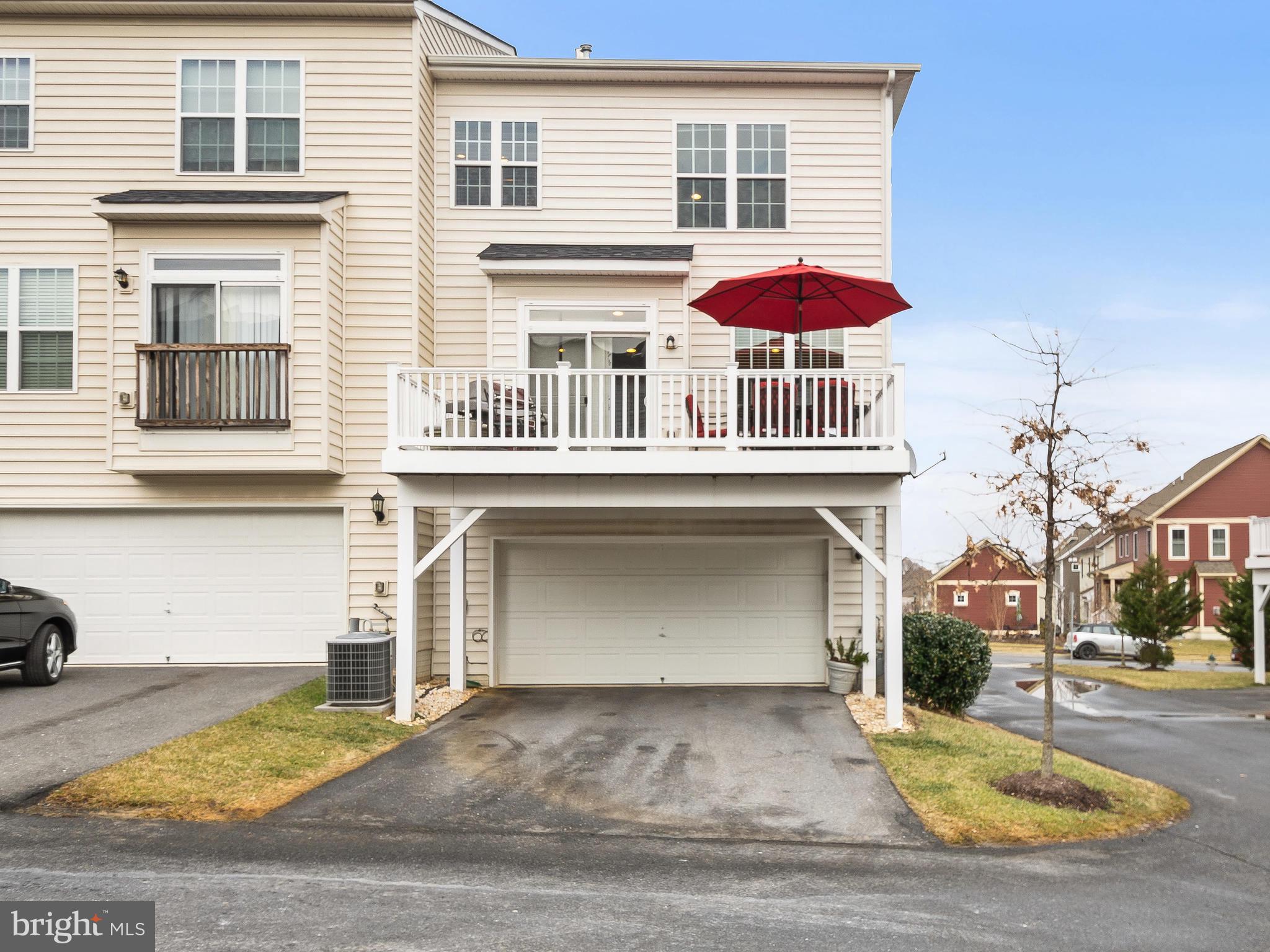 13610 Stargazer Lane Silver Spring, MD 20906 - Photo 39 of 43 a front view of a house with a garage