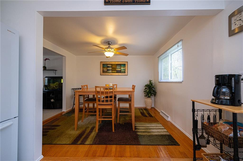 602 Flint Road Allison Park, PA 15101 - Photo 12 of 25 DINING ROOM 11X10: Another view from the kitchen shows the open floor plan and ceiling fan.