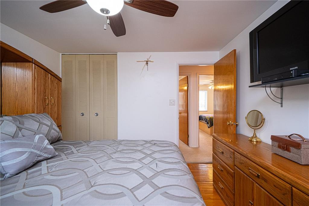 602 Flint Road Allison Park, PA 15101 - Photo 14 of 25 MASTER BEDROOM 11X11: Another view showing your floor to ceiling closet that gives you extra storage. Ceiling fan for cooling off. TV brackets will stay but not the TV.