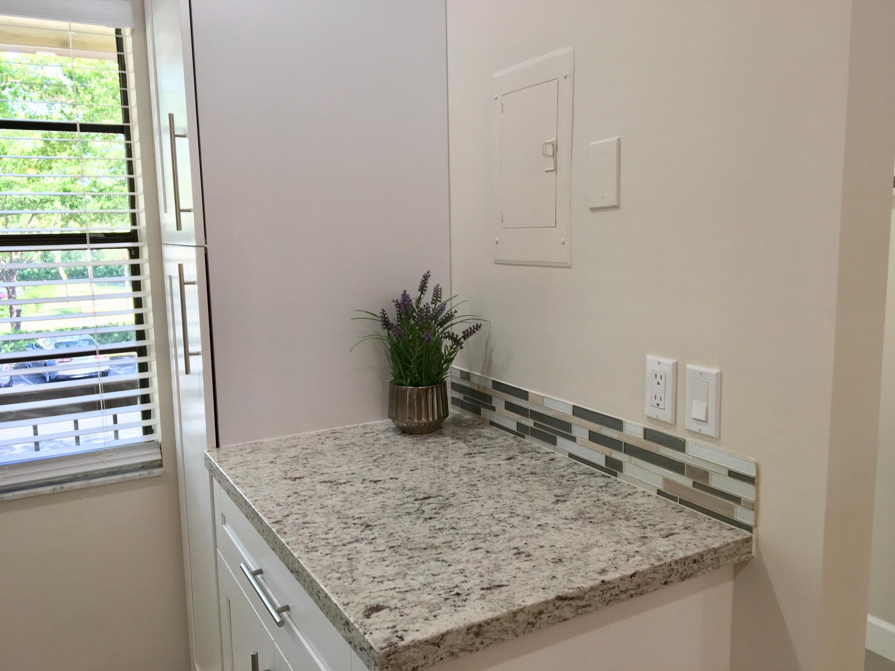 21731 Arriba Real, Unit 27D Boca Raton, FL 33433 - Photo 11 of 42 Kitchen 4