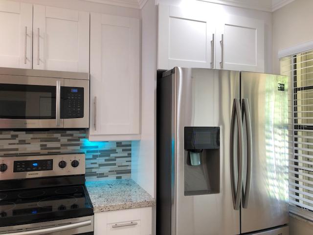 21731 Arriba Real, Unit 27D Boca Raton, FL 33433 - Photo 13 of 42 Kitchen 6