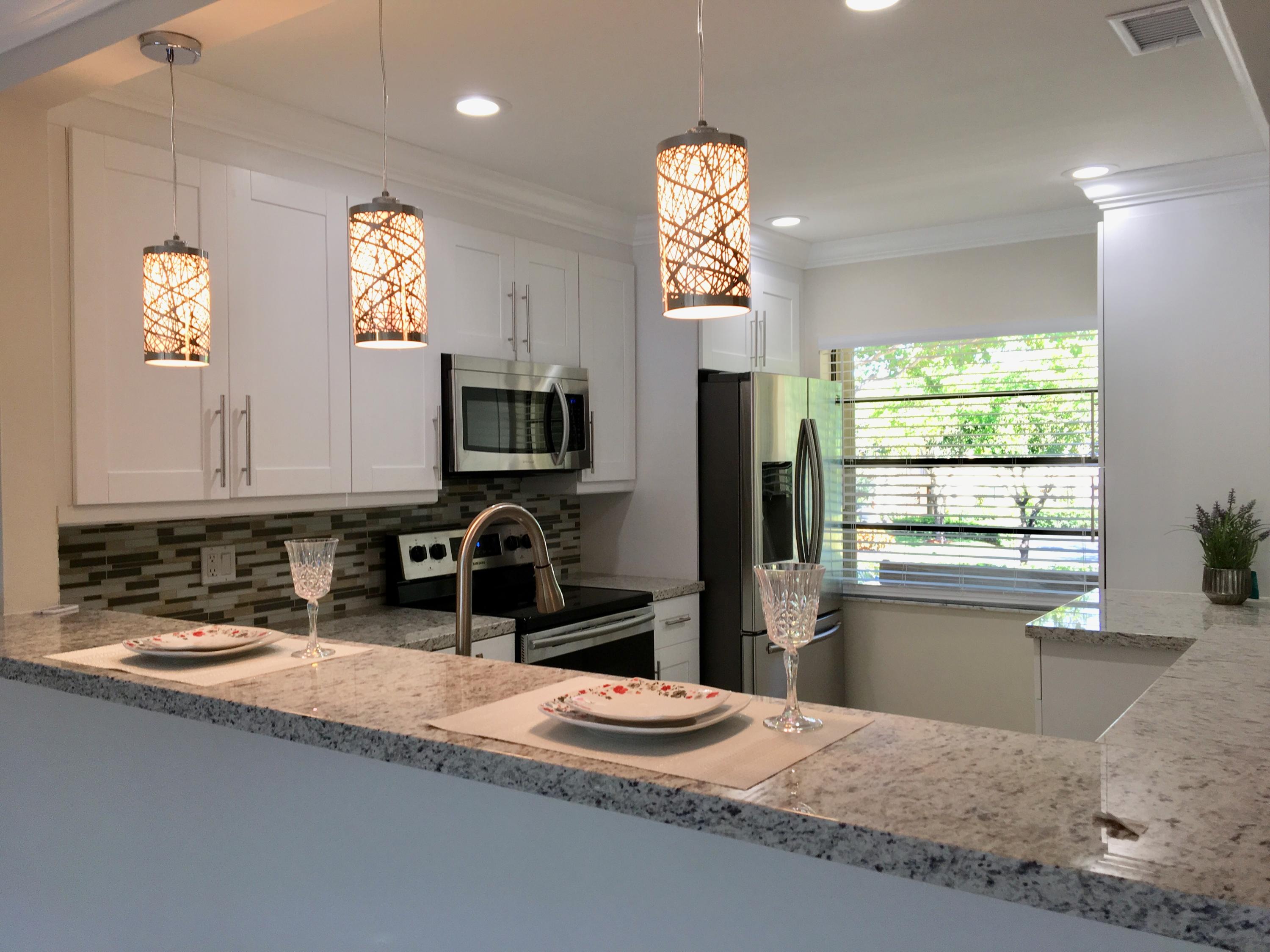 21731 Arriba Real, Unit 27D Boca Raton, FL 33433 - Photo 15 of 42 Kitchen 8