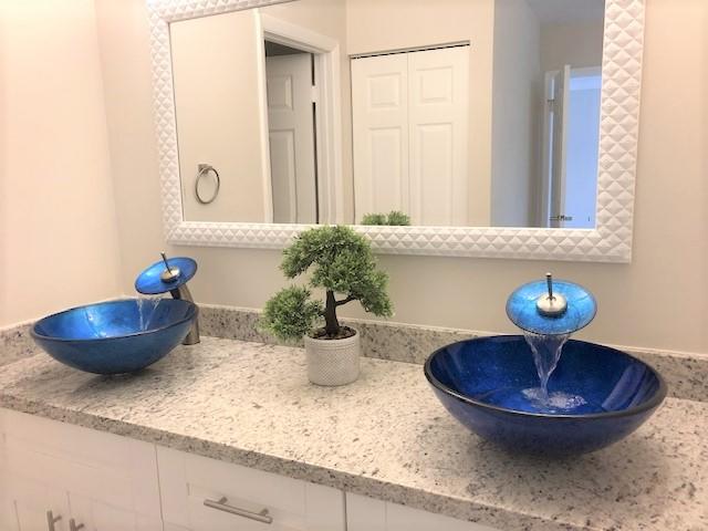 21731 Arriba Real, Unit 27D Boca Raton, FL 33433 - Photo 19 of 42 Master bath vanity