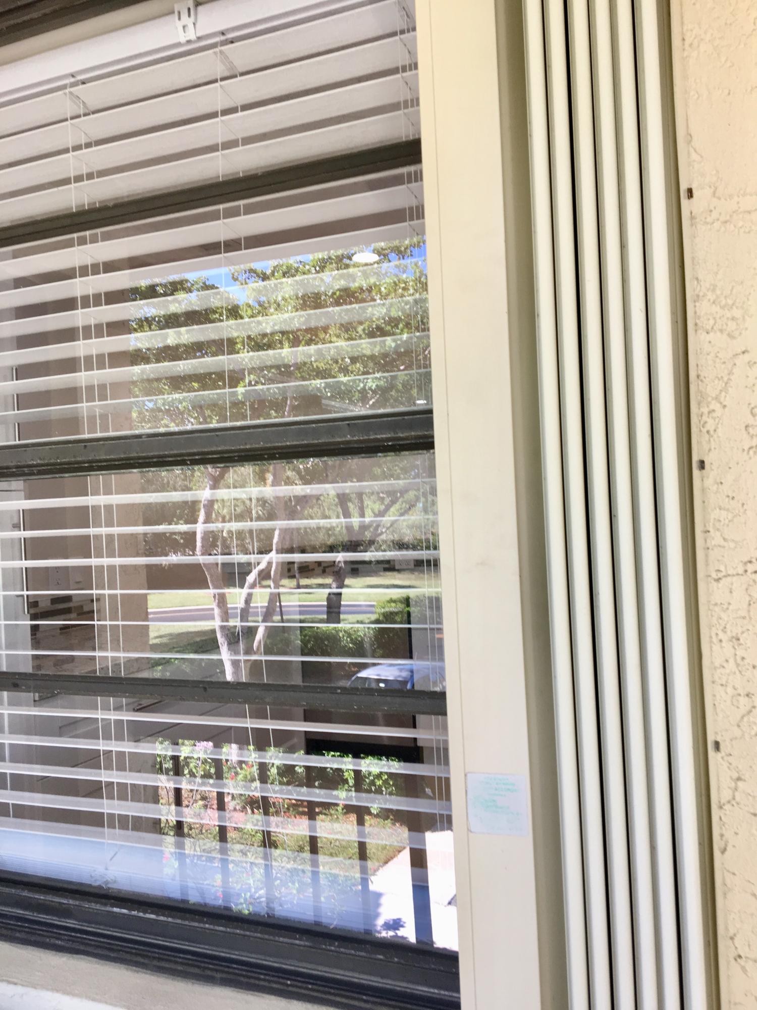 21731 Arriba Real, Unit 27D Boca Raton, FL 33433 - Photo 34 of 42 Accordion Shutters