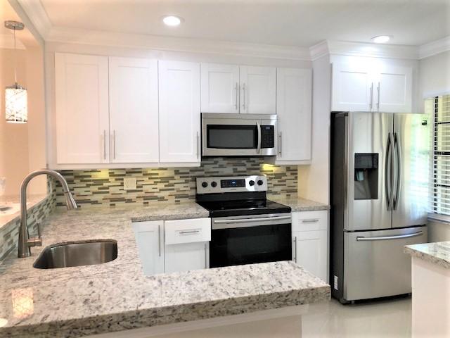 21731 Arriba Real, Unit 27D Boca Raton, FL 33433 - Photo 9 of 42 Kitchen 2