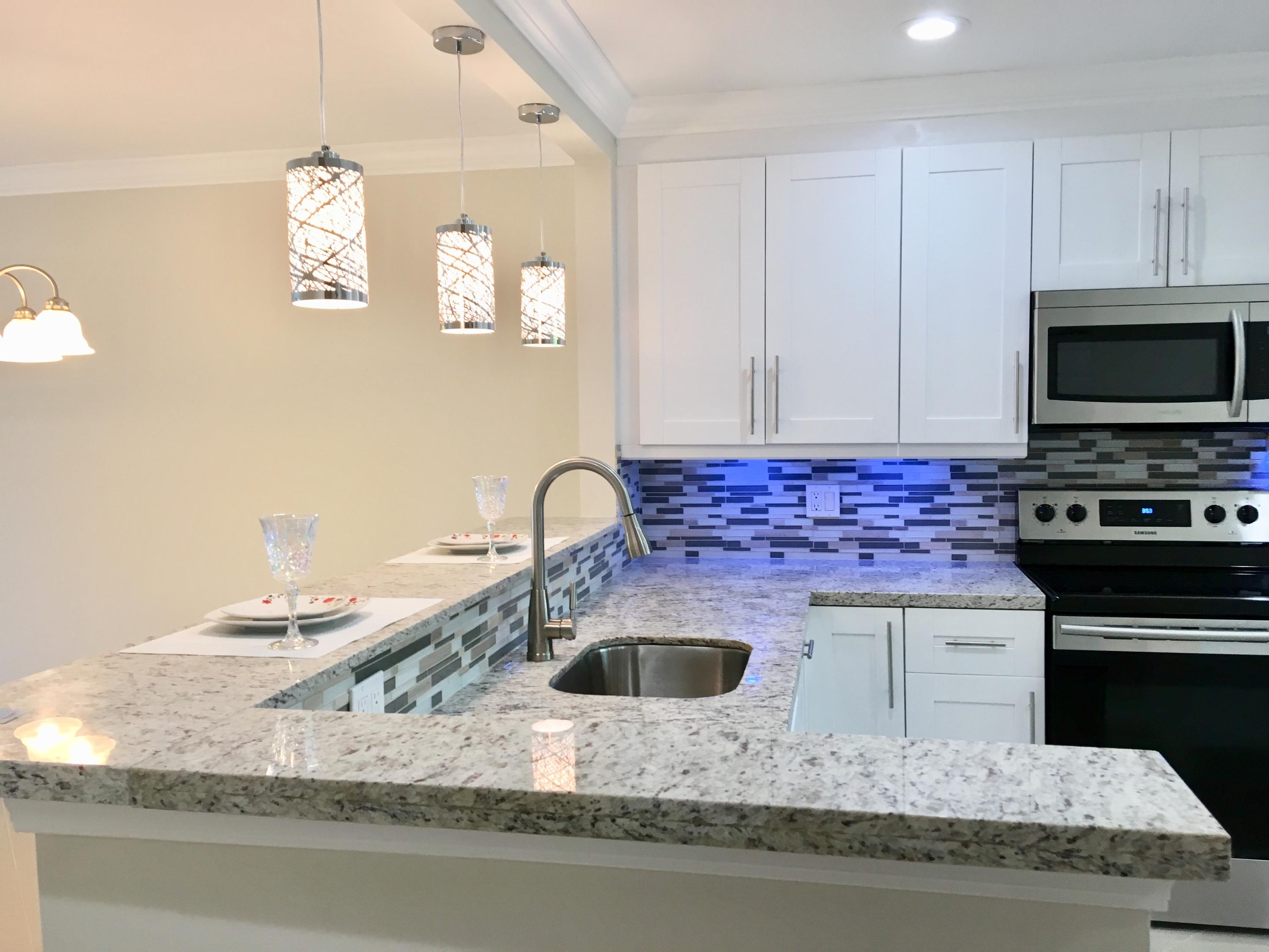 21731 Arriba Real, Unit 27D Boca Raton, FL 33433 - Photo 10 of 42 Kitchen 3