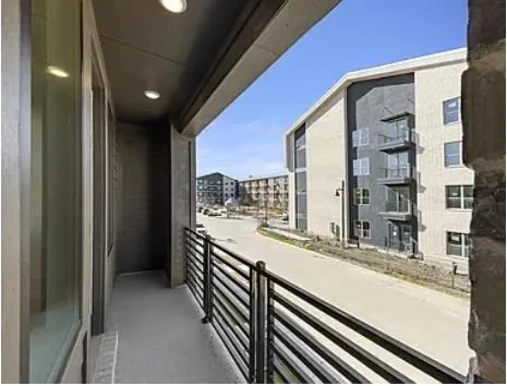 a bathroom with a double vanity sink and a shower
