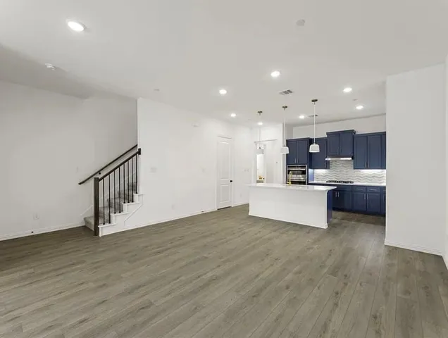 a bathroom with a sink a mirror and a shower