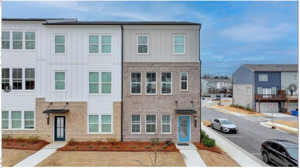 a front view of a building with multiple windows