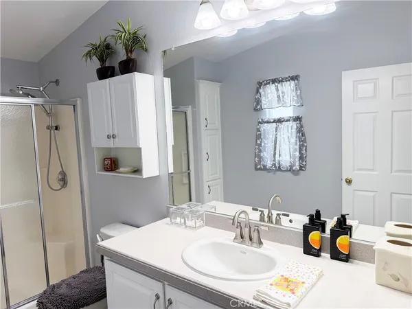 a bathroom with a tub toilet and sink