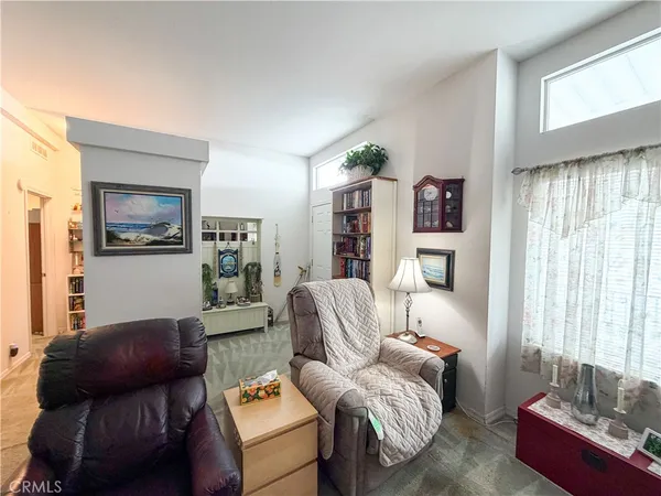 a kitchen with stainless steel appliances granite countertop a stove and a refrigerator