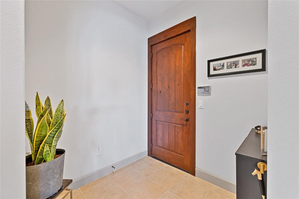 610 Via Ravello, Unit 207 Irving, TX 75039 - Photo 18 of 34 a view of hallway with wooden floor