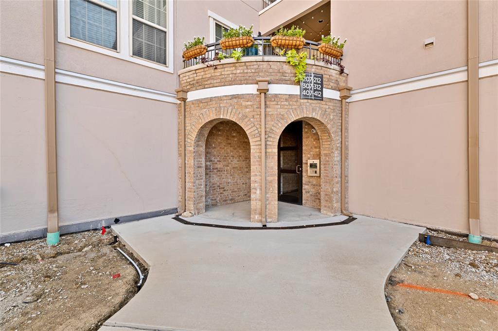 610 Via Ravello, Unit 207 Irving, TX 75039 - Photo 23 of 34 a view of a fireplace with a sink