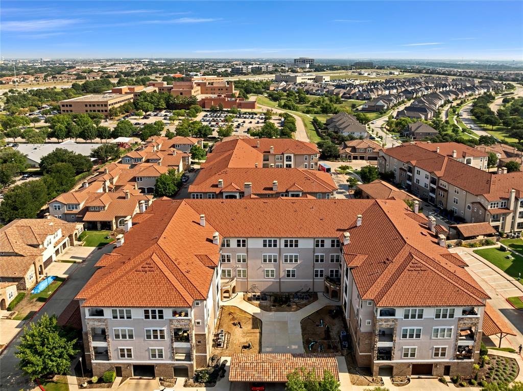 610 Via Ravello, Unit 207 Irving, TX 75039 - Photo 27 of 34 an aerial view of residential houses with city view