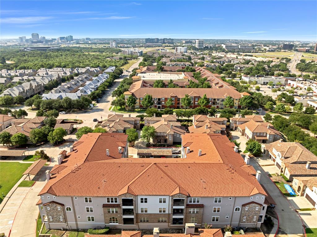 610 Via Ravello, Unit 207 Irving, TX 75039 - Photo 29 of 34 an aerial view of residential houses with outdoor space