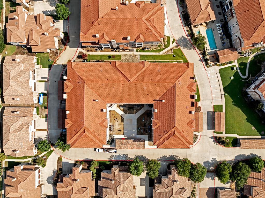 610 Via Ravello, Unit 207 Irving, TX 75039 - Photo 30 of 34 an aerial view of houses with outdoor space