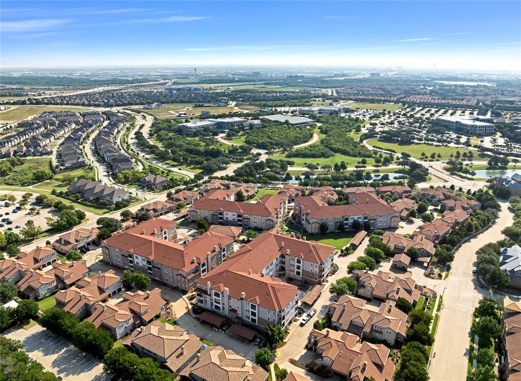 610 Via Ravello, Unit 207 Irving, TX 75039 - Photo 32 of 34 an aerial view of residential houses with outdoor space