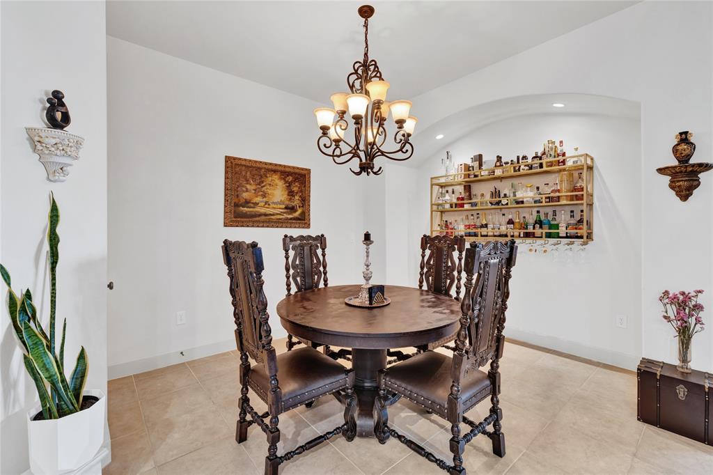 610 Via Ravello, Unit 207 Irving, TX 75039 - Photo 9 of 34 a dining room with furniture and window