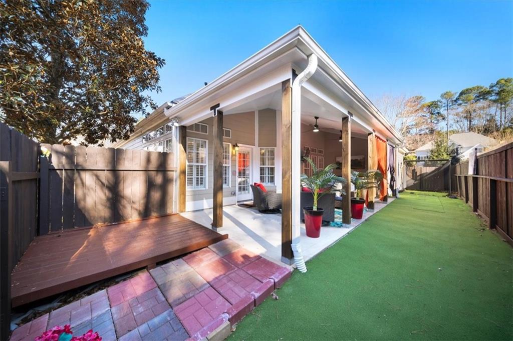 701 Redwood Pass Canton, GA 30114 - Photo 11 of 45 a front view of a house with a yard