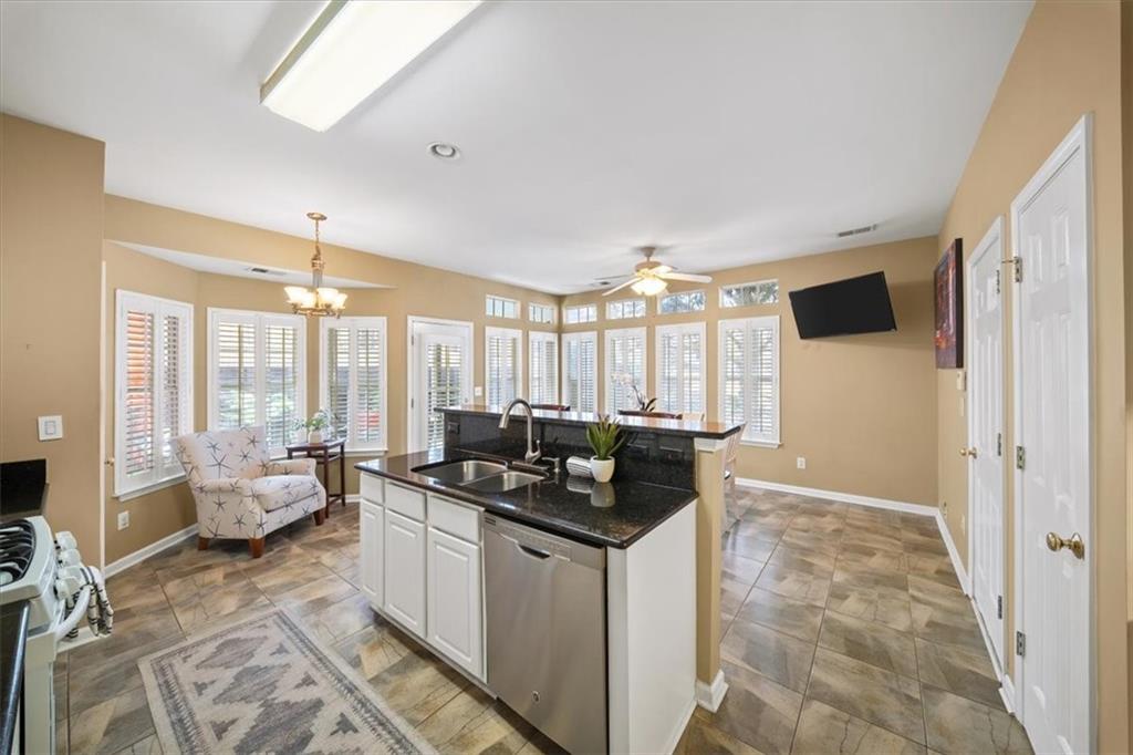701 Redwood Pass Canton, GA 30114 - Photo 15 of 45 a living room with furniture and a flat screen tv