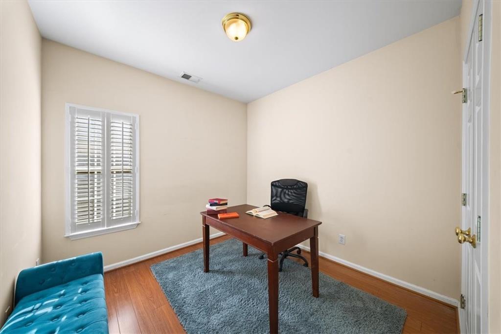 701 Redwood Pass Canton, GA 30114 - Photo 28 of 45 a living room with furniture and a window