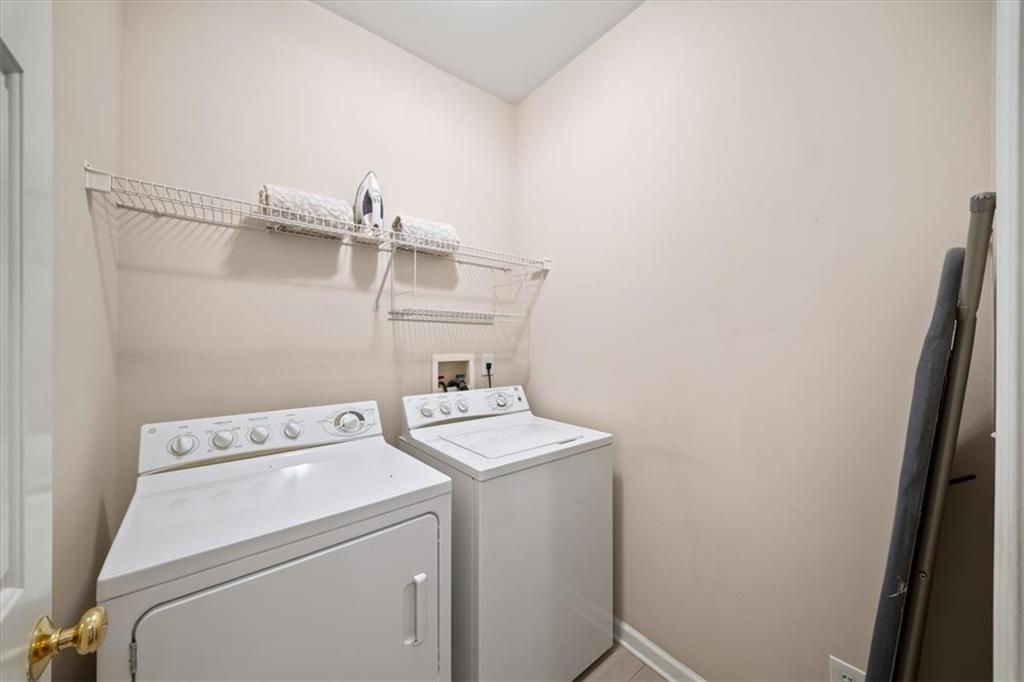 701 Redwood Pass Canton, GA 30114 - Photo 30 of 45 a utility room with dryer and washer