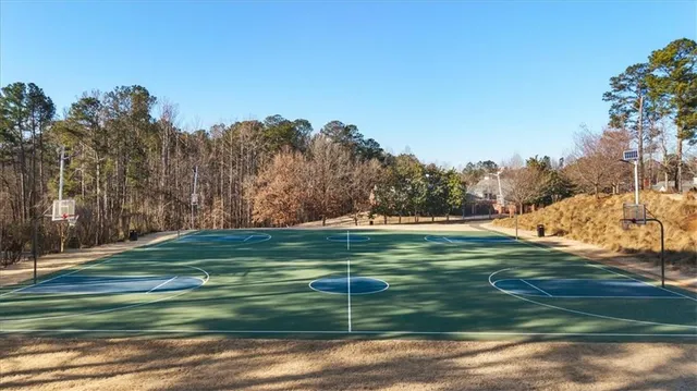 an aerial view of a house with yard