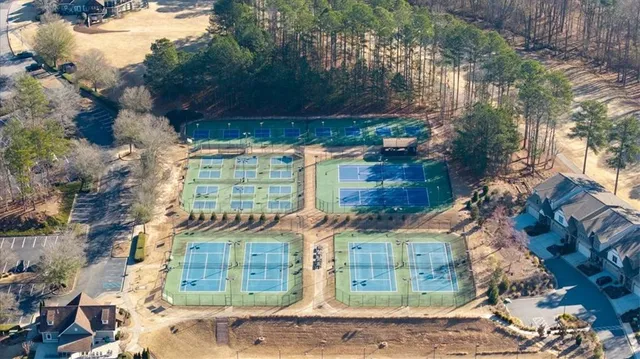a view of a swimming pool with an outdoor seating