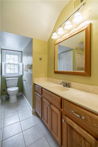 4578 Middle Road Allison Park, PA 15101 - Photo 22 of 25 The fourth bedroom ensuite with an oversized vanity and ceramic surround tub/shower.