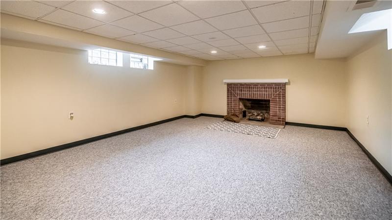 4578 Middle Road Allison Park, PA 15101 - Photo 23 of 25 Need more space...the finished game room features a fireplace.