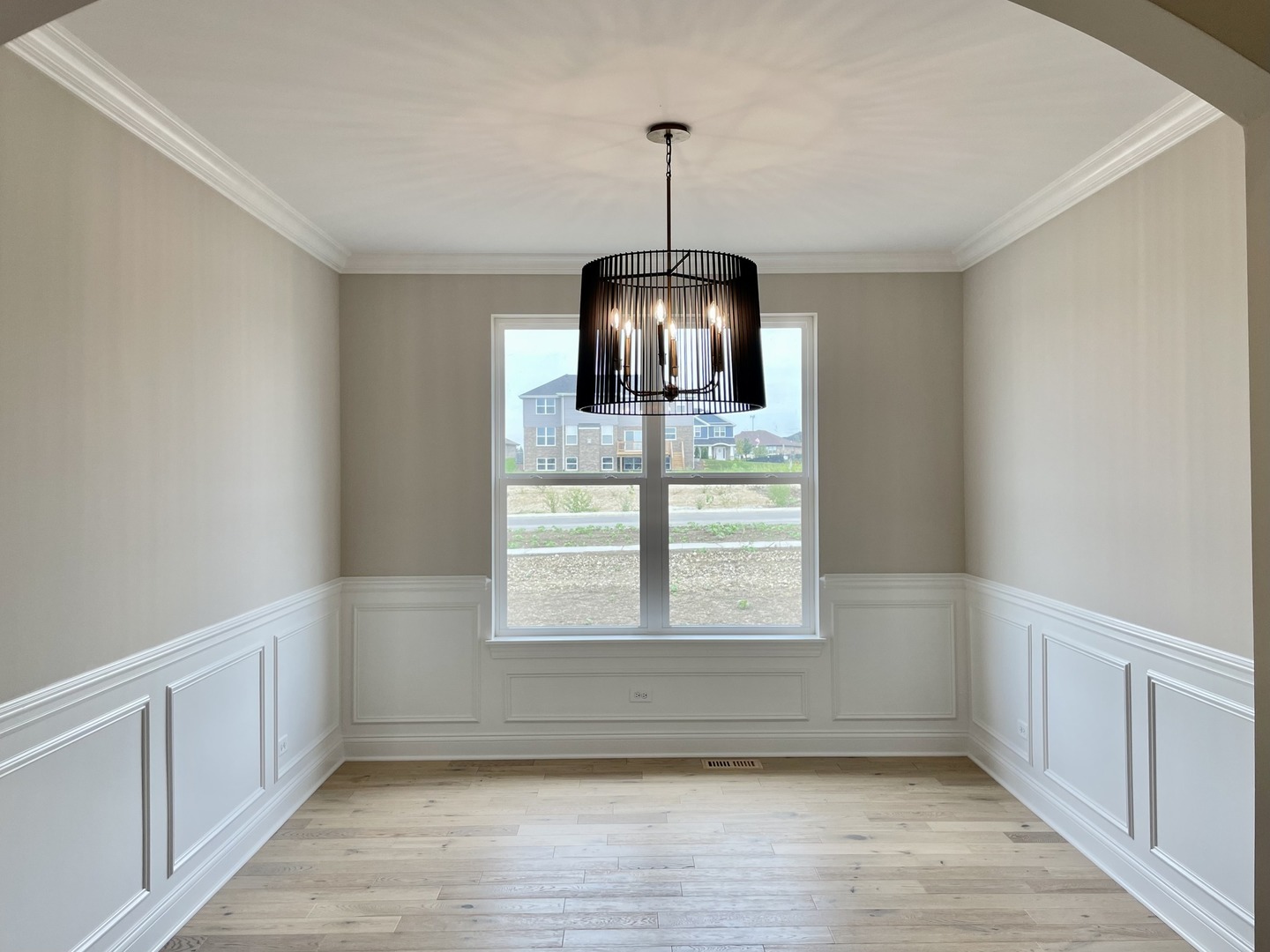 15919 Prairie View Court, Unit T2 New Lenox, IL 60451 - Photo 29 of 29 a view of an empty room with a window and wooden floor