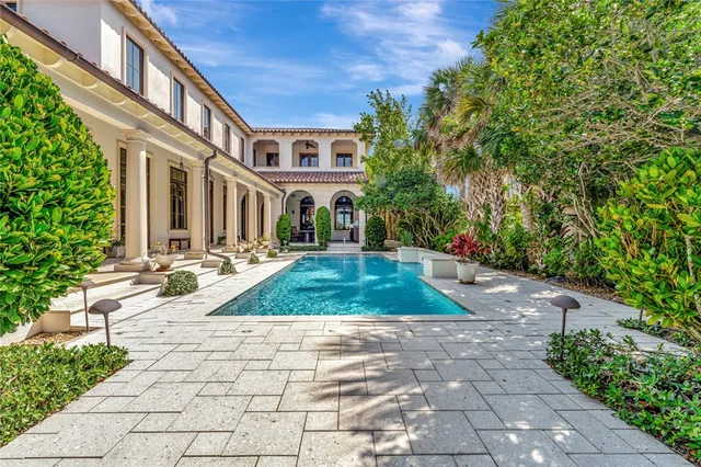 a very nice looking living room with a large window