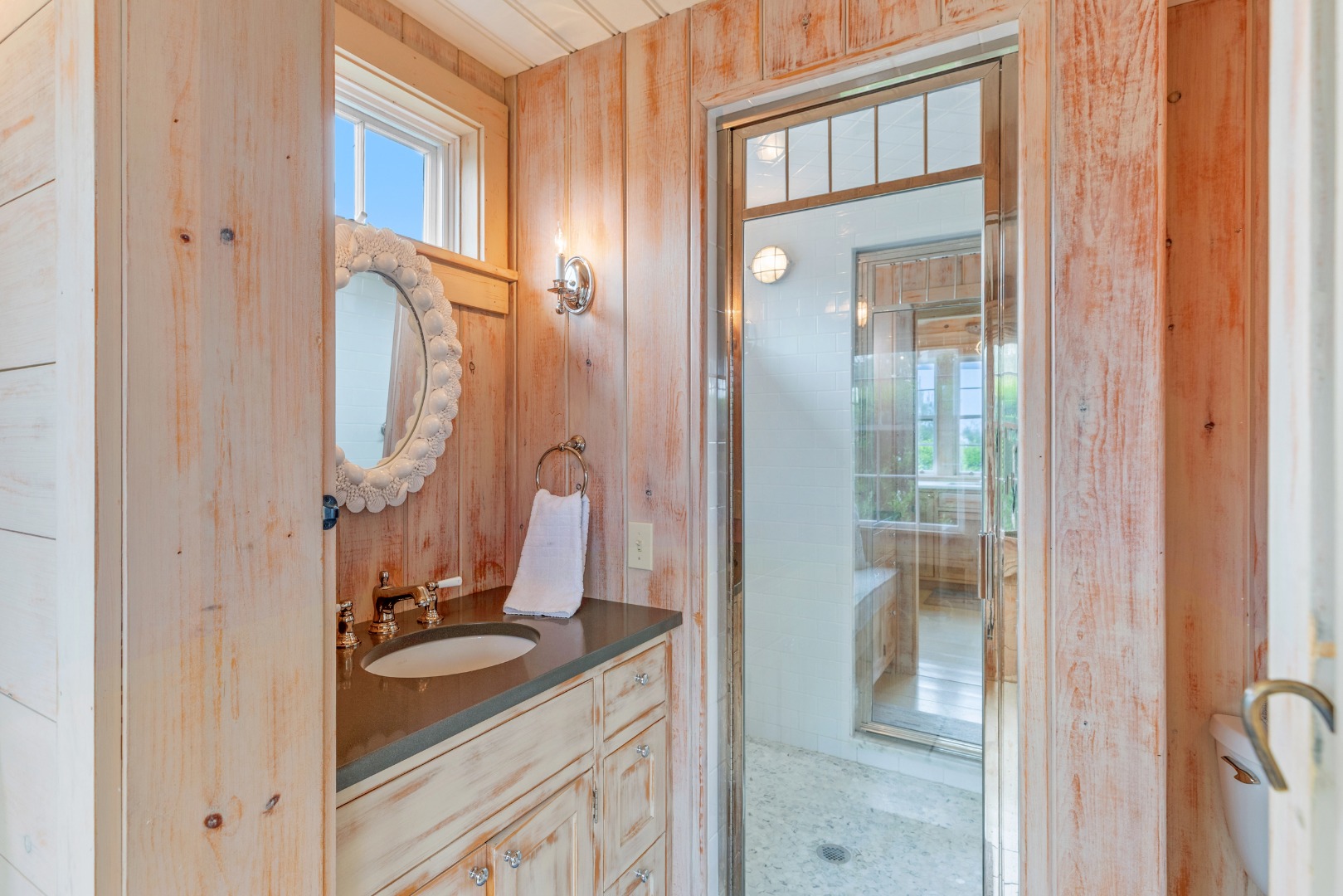 3 North Gully Road Nantucket, MA 02554 - Photo 22 of 43 a bathroom with a granite countertop sink a mirror and a shower