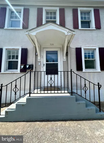 a view of a building with a street