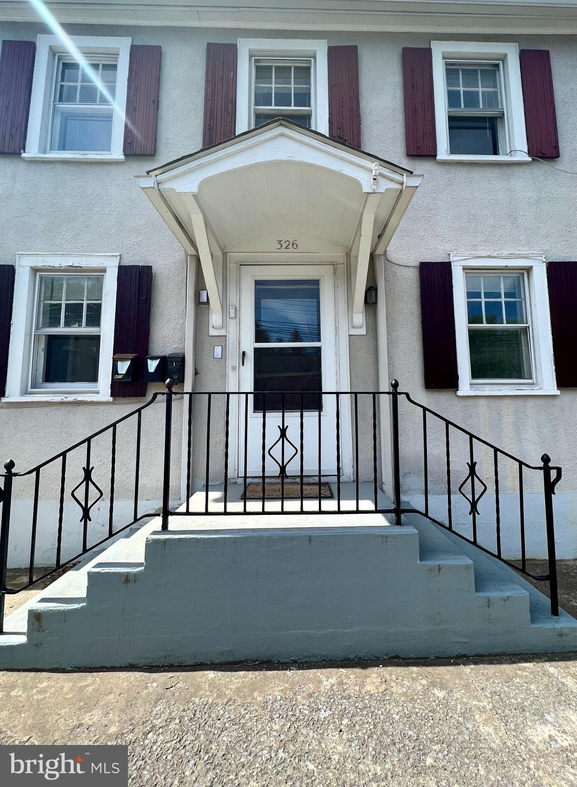 a view of a building with a street