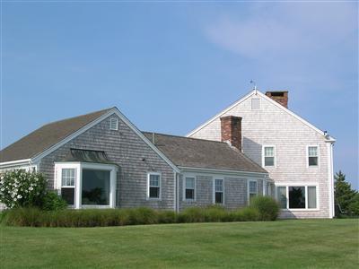 174 Eastward Road Chatham, MA 02633 - Photo 9 of 21 a front view of a house with a garden
