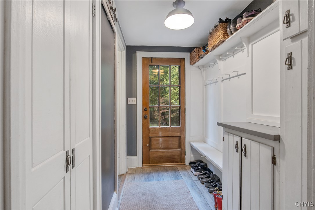 1205 North James Street Rome, NY 13440 - Photo 33 of 43 This is the mudroom with 1/2 bath, and exit to bac