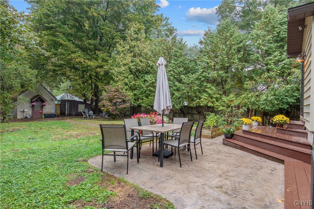1205 North James Street Rome, NY 13440 - Photo 37 of 43 Close-up of stampcrete patio and looking towards t