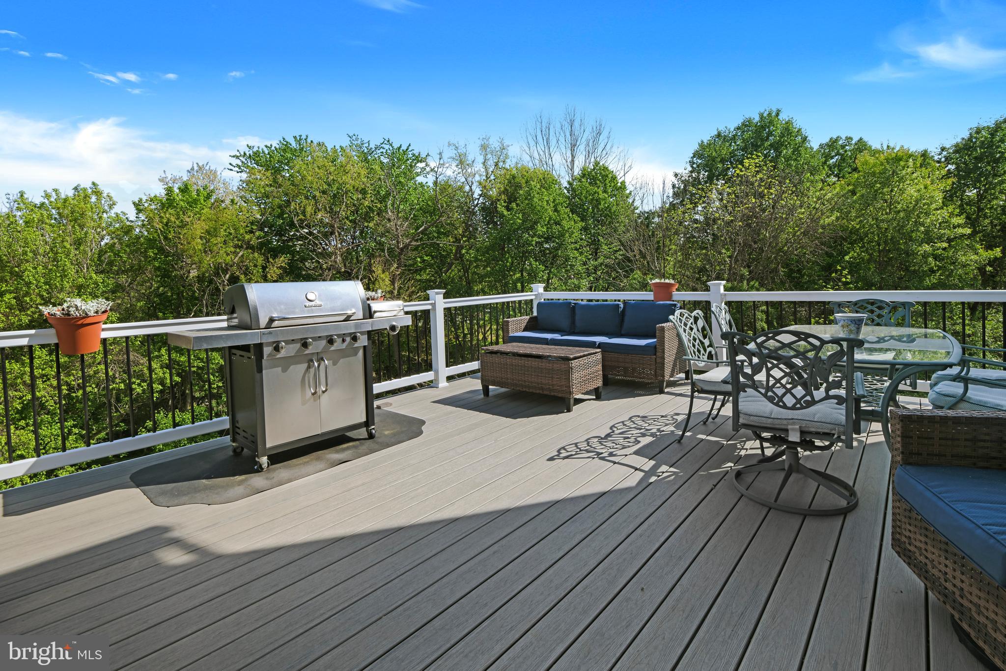 9105 Hendry Terrace Frederick, MD 21704 - Photo 13 of 51 a view of roof deck with furniture