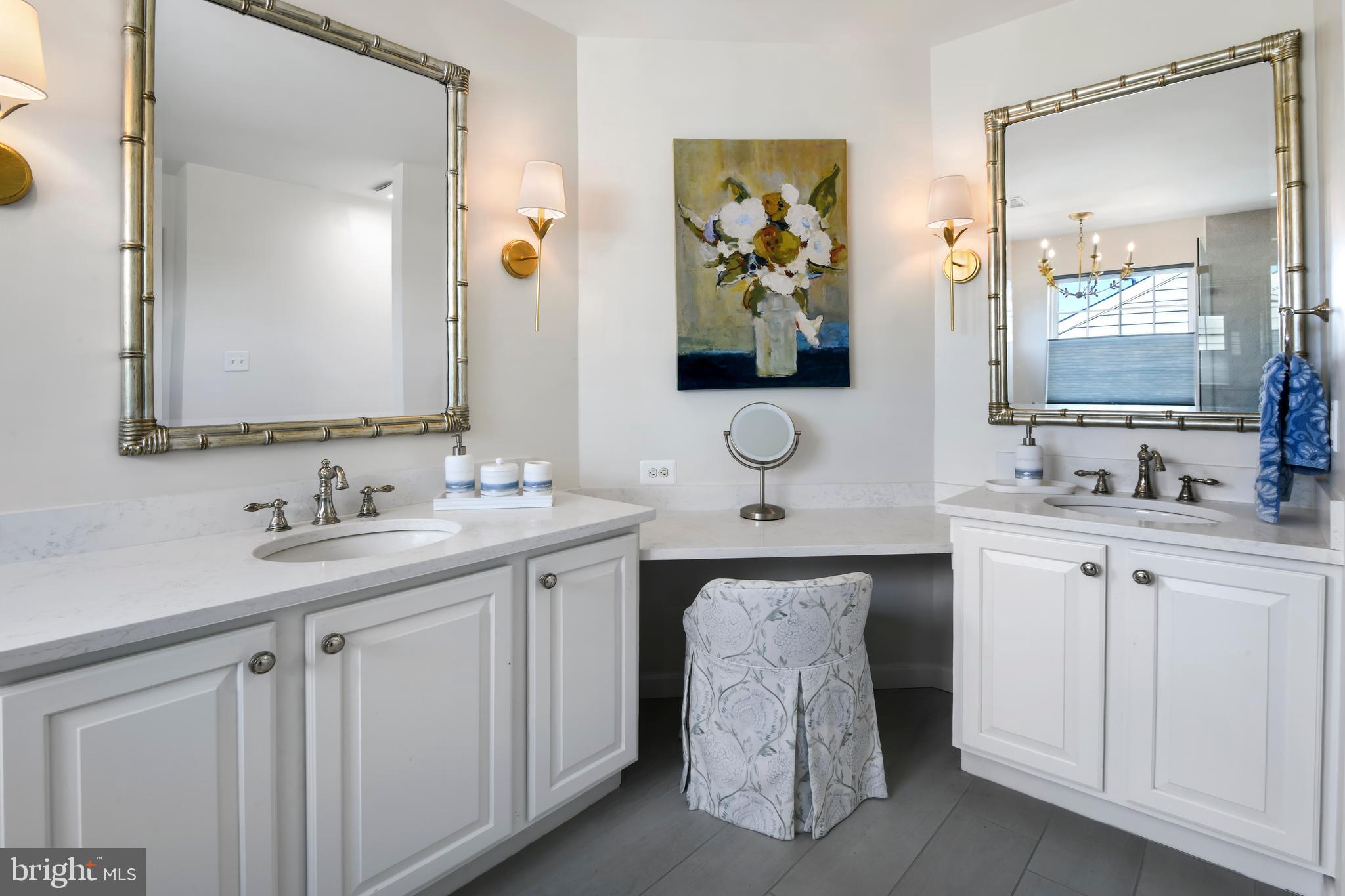 9105 Hendry Terrace Frederick, MD 21704 - Photo 20 of 51 a bathroom with a double vanity sink and a mirror