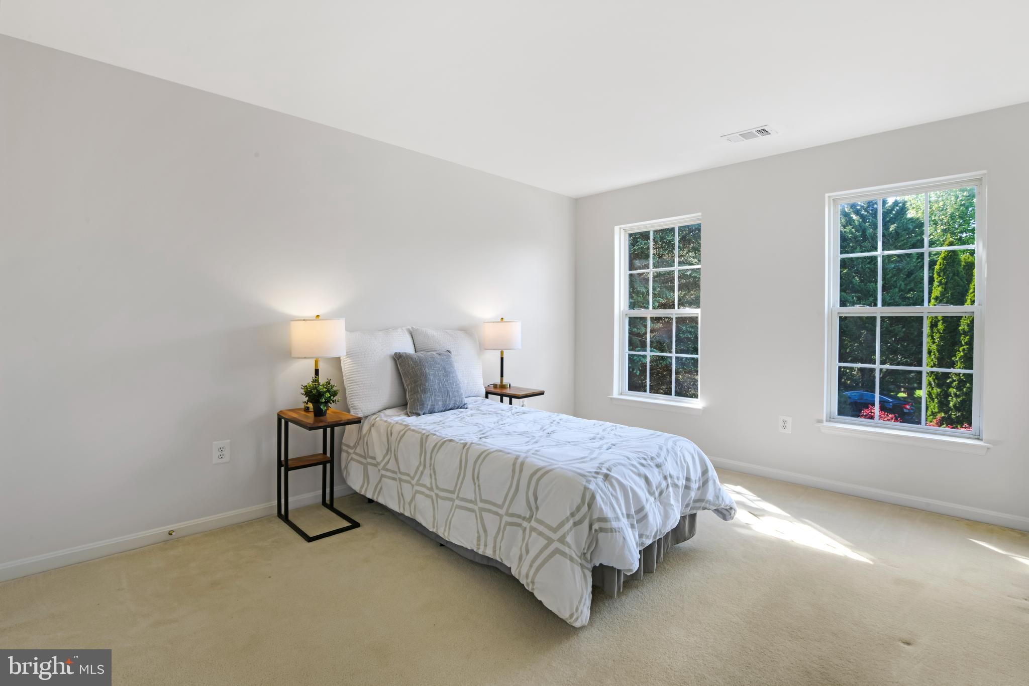 9105 Hendry Terrace Frederick, MD 21704 - Photo 22 of 51 a bedroom with a bed and window