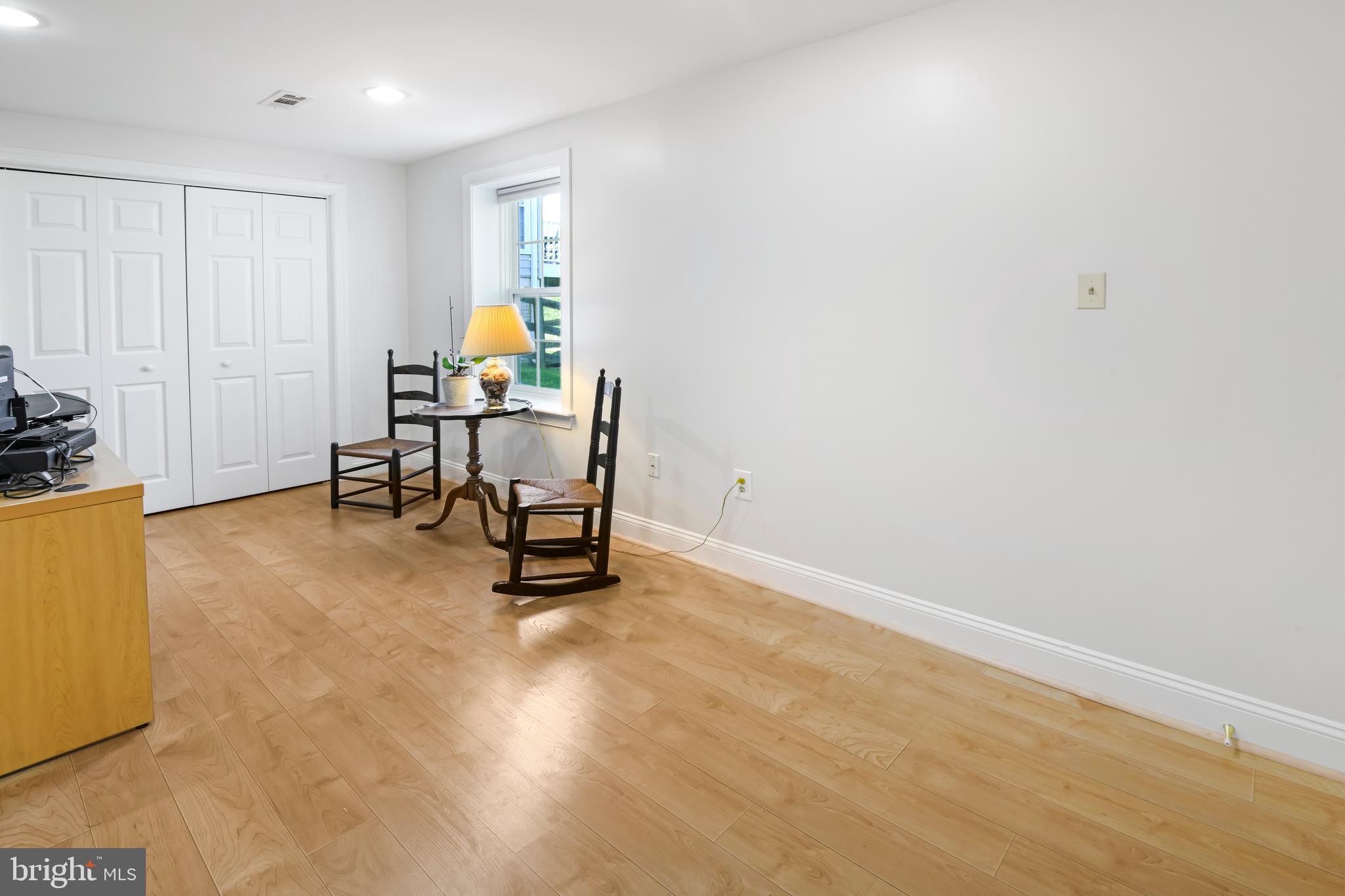 9105 Hendry Terrace Frederick, MD 21704 - Photo 34 of 51 a workspace with furniture and wooden floor