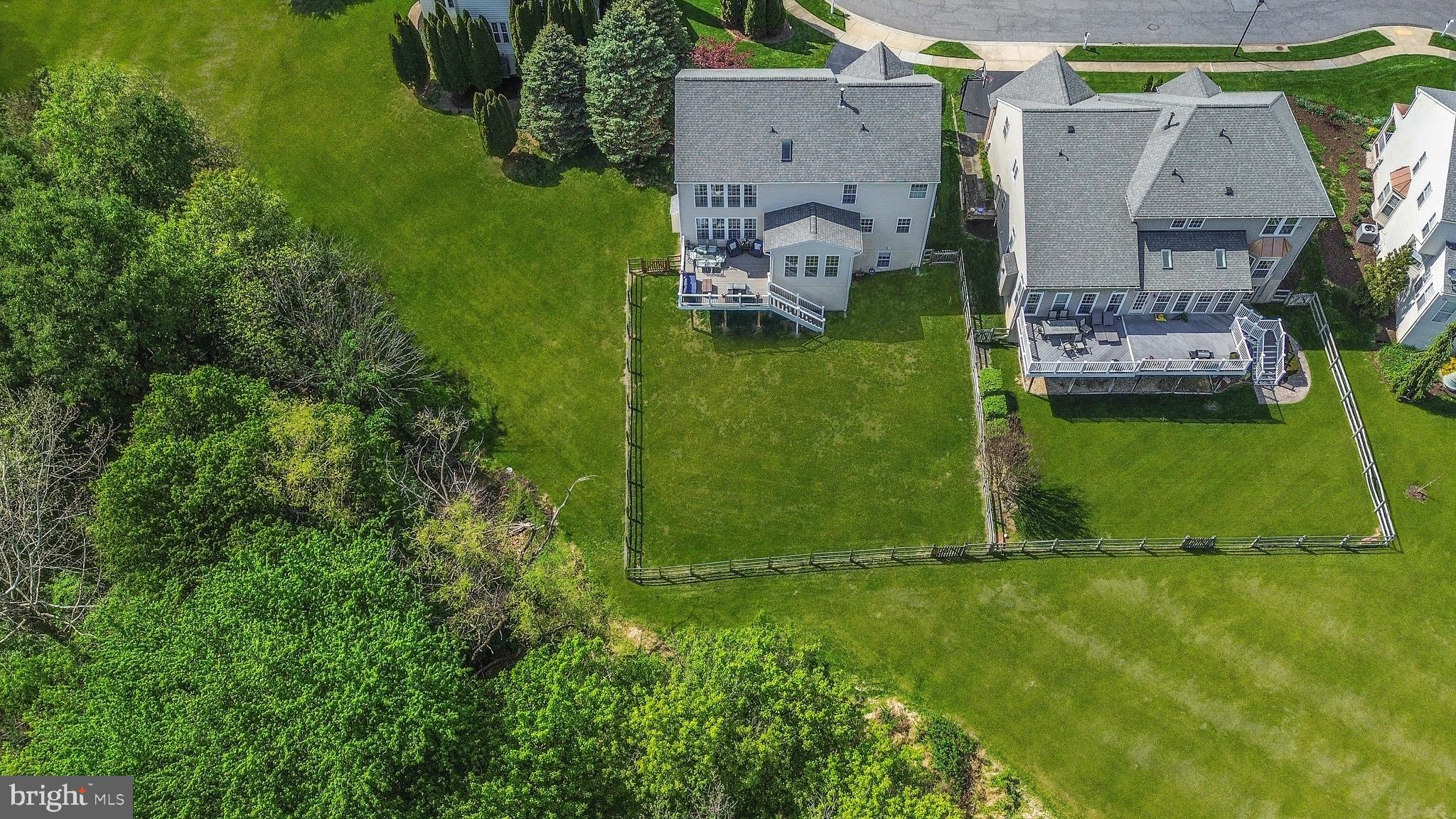 9105 Hendry Terrace Frederick, MD 21704 - Photo 36 of 51 an aerial view of a house with a yard