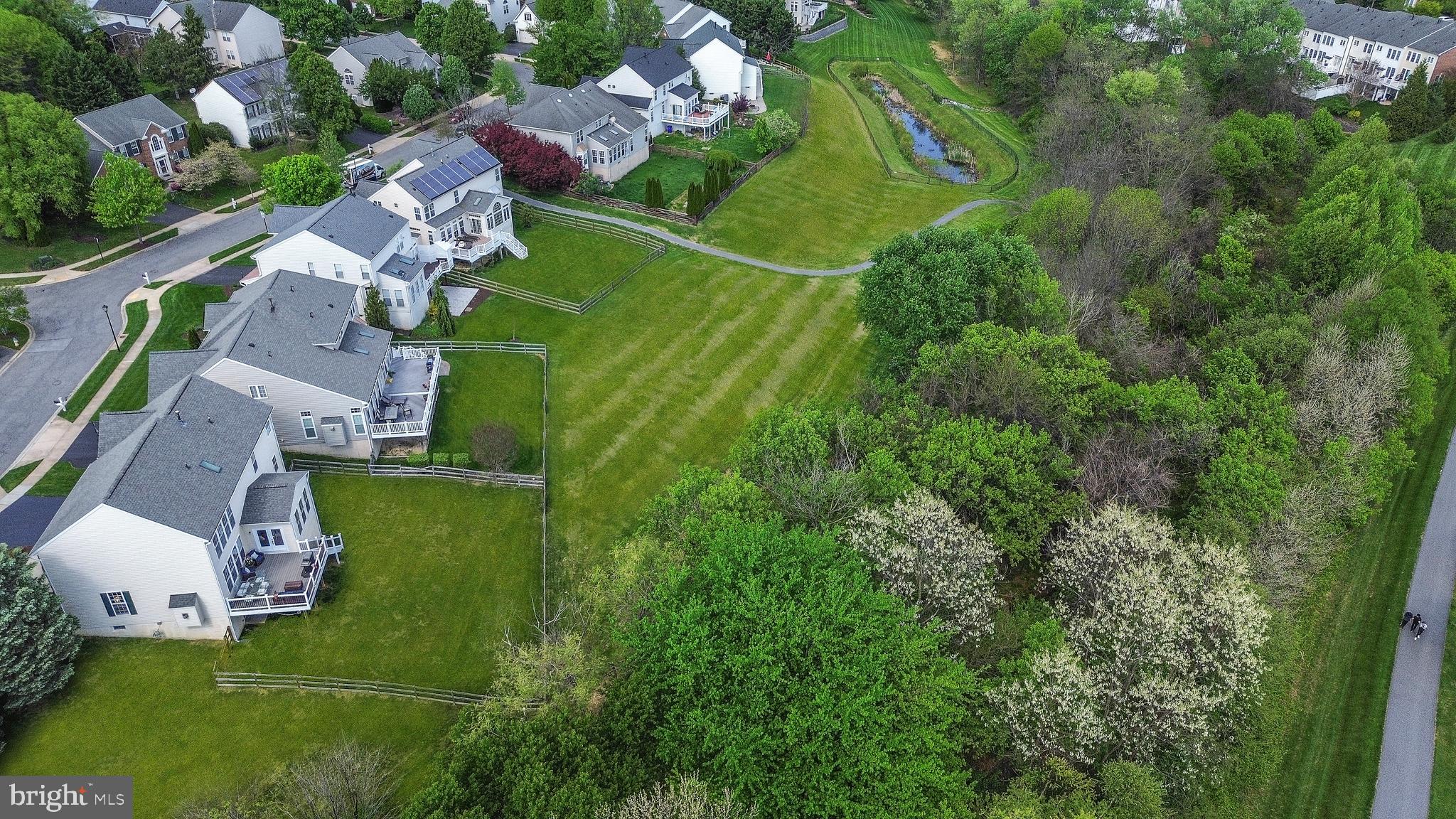 9105 Hendry Terrace Frederick, MD 21704 - Photo 37 of 51 an aerial view of residential house with outdoor space and street view
